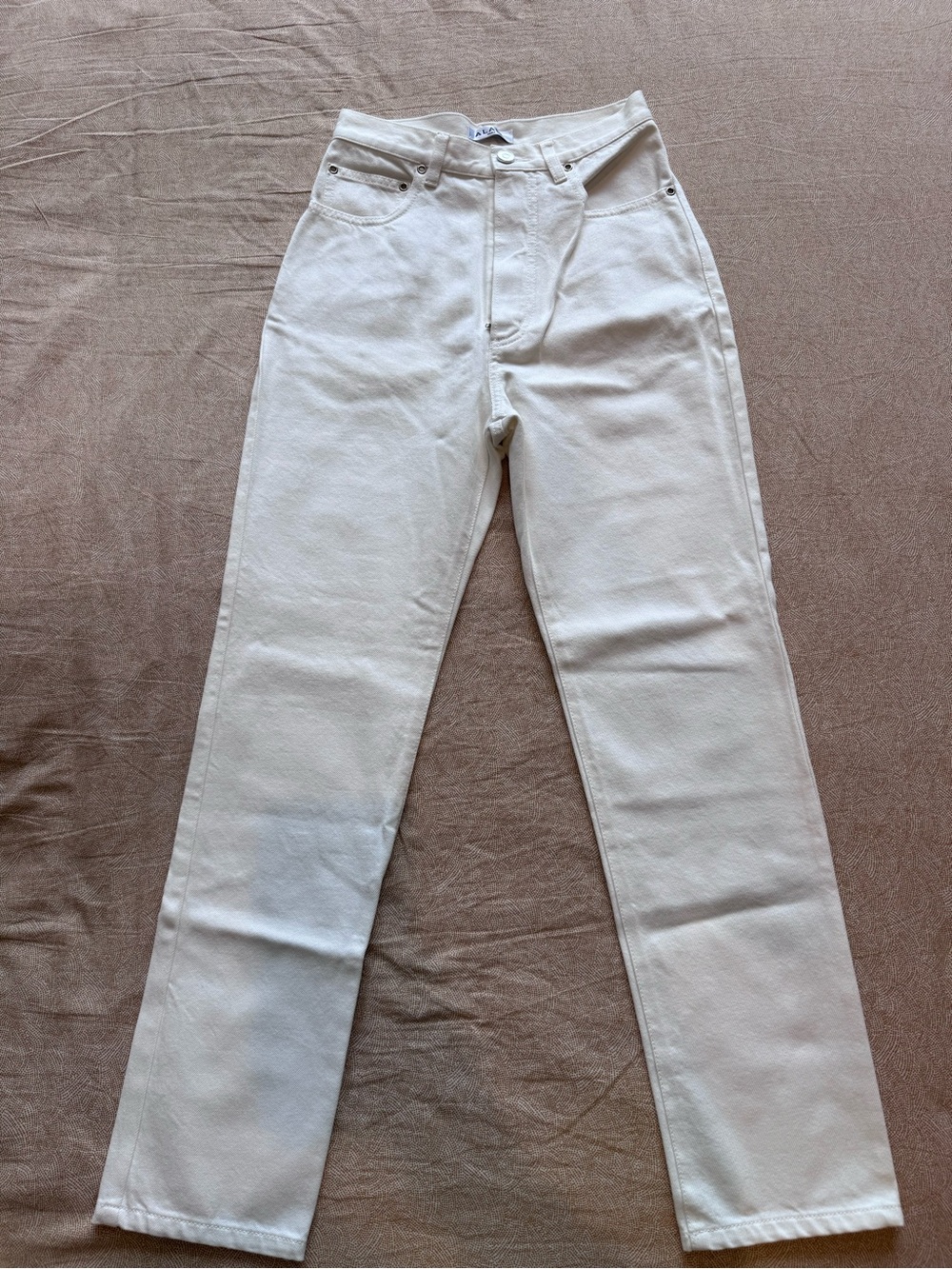 ALAÏA High-Rise Straight Leg Off-White Jeans